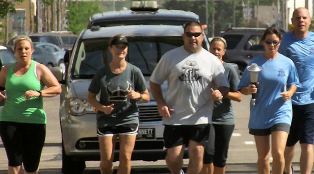 A torch that will ultimately end up at the Special Olympics games in Wichita was carried through the streets of Salina on Wednesday.